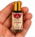 Load image into Gallery viewer, Amber parfymolja 10 ml – flaska i handen | Beauty of India
