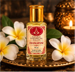 Ladda upp bild till gallerivisning, Frangipani parfymolja 10 ml – inspirationsbild med frangipaniblommor | Beauty of India
