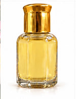 Ladda upp bild till gallerivisning, Nirvana parfymolja 10 ml – flaska bakifrån med ljus olja | Beauty of India
